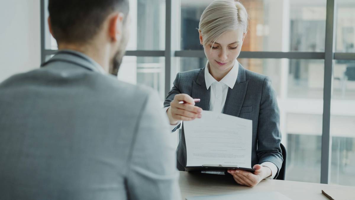 Illustration showing a shocked freelancer facing a large invoice labeled Attorney Retainer Fees