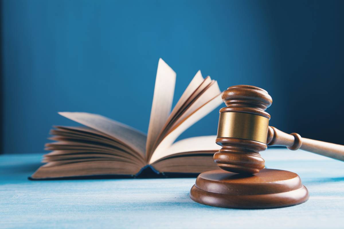 Legal team reviewing documents during Patent Validity Challenges for a tech startup