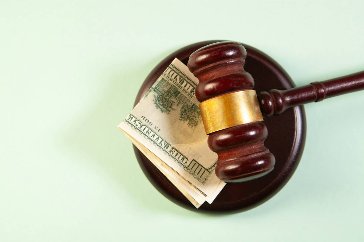 Settlement Payment Limits illustrated with scale balancing legal fees and insurance coverage